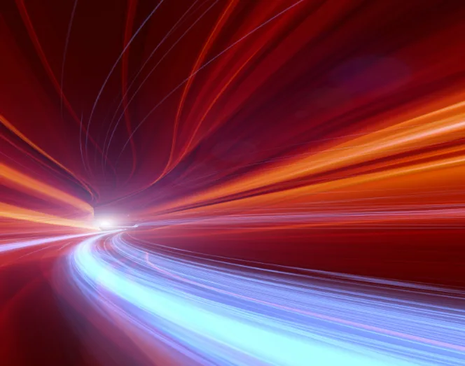Abstrakte Lichtspuren als Symbol für Geschwindigkeit und Innovation